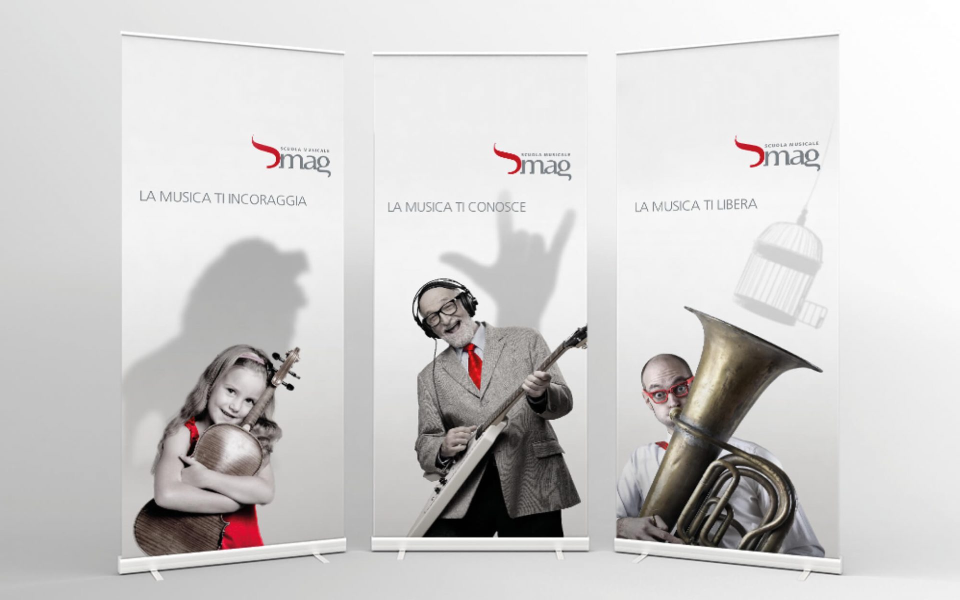 banner pubblicitario inaugurazione sede scuola musicale riva, progetto advertising diade studio arco di trento